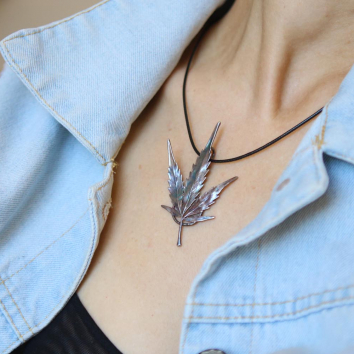 Real Cannabis leaf pendant in colored silver